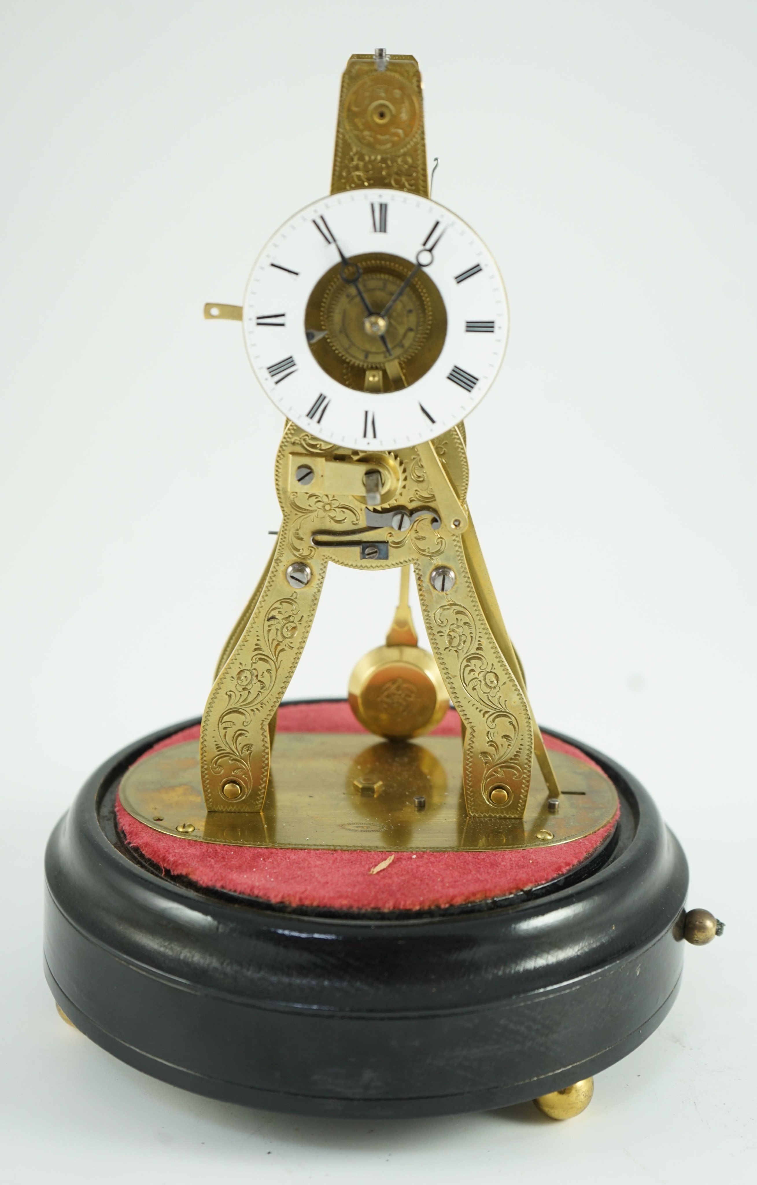 Pierret a Paris. Ms Honorables Exp. Paris. Londres. A small 19th French skeleton alarm timepiece, overall height 30cm, clock height 17cm